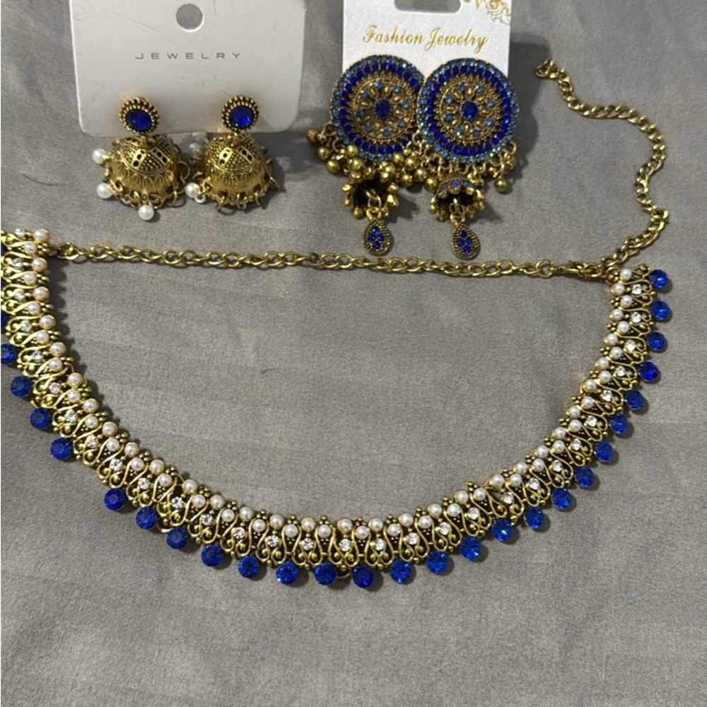 Intricate Gold and Blue Necklace with Elegant Design